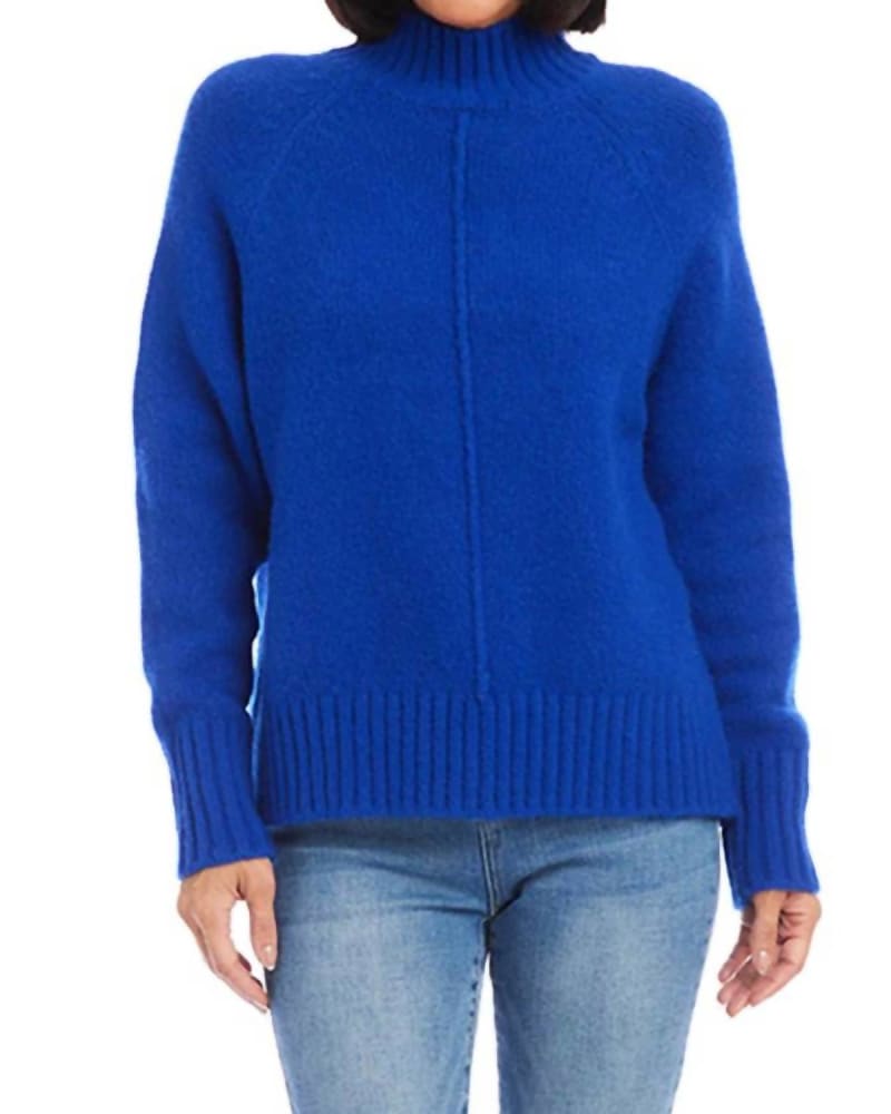 Front of a model wearing a size L Turtleneck Sweater in Royal in Royal by Karen Kane. | dia_product_style_image_id:365047